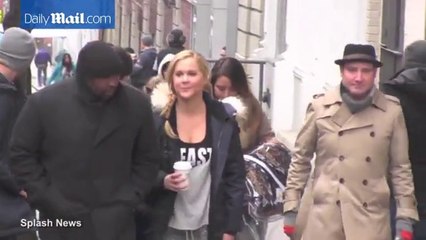 Amy Schumer arrives on set with boyfriend Ben Hanisch in NYC