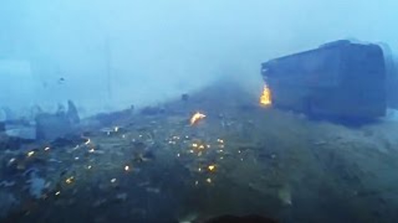 Driver Dodges Debris After Collision