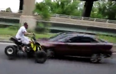 Idiot On 4-Wheeler Hits A Car Head On