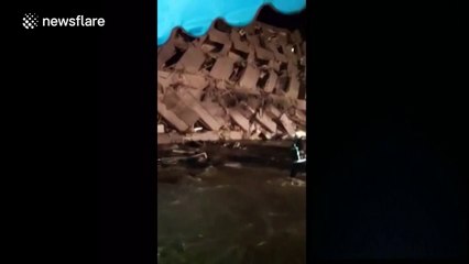 Earthquake knocks over Taiwan apartment complex