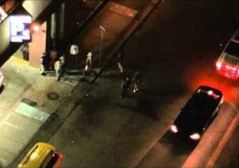 Glass Bottle Thrown From Balcony at Crowd