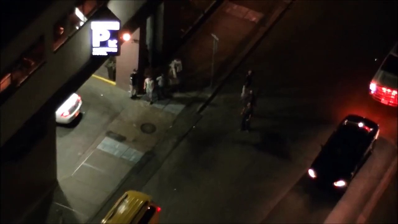 Glass Bottle Thrown From Balcony at Crowd