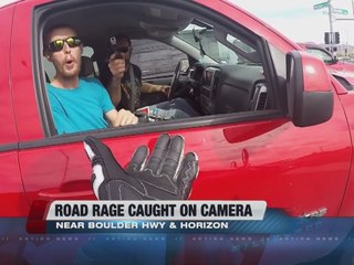 Truck driver points gun at valley biker