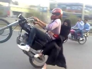 Lahori boy one wheeling with his girl friend