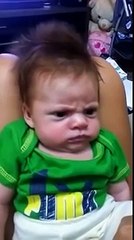 Pissed off and angry baby. Funny face.. !!!