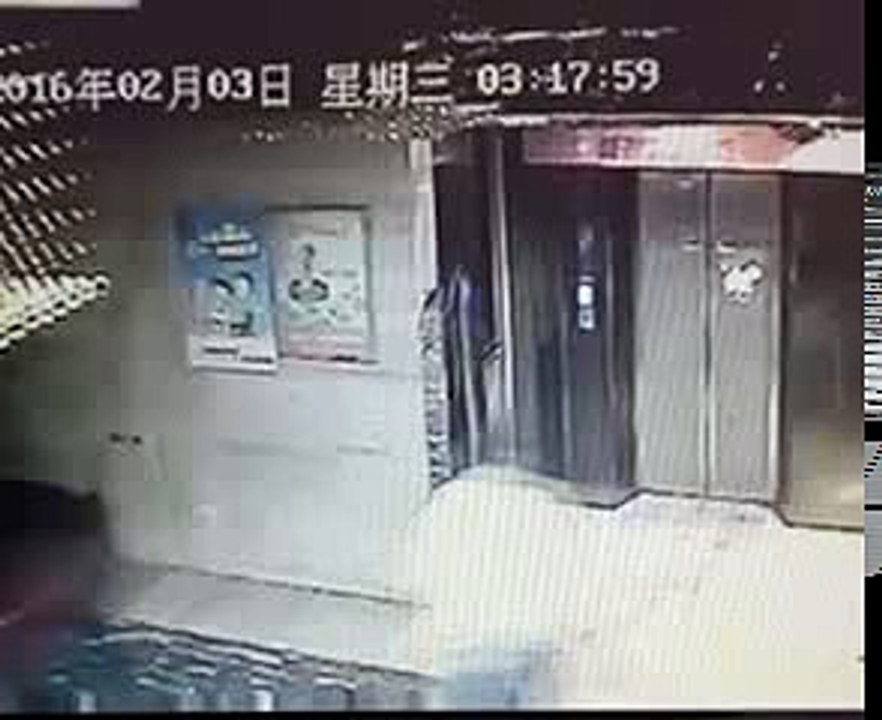 CCTV Drunk man falls into shaft after kicking elevator door 2016
