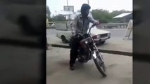 Biker shows off his Doughnut stunt