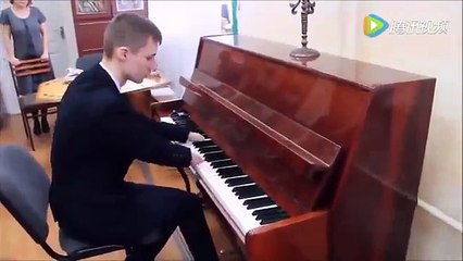 15-year-old playing the piano masterfully despite born without HANDS