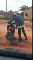 Drunkard repeatedly falling when trying to ride the bike !!!