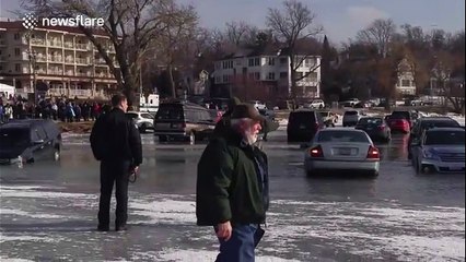 Cars parked on ice near Chicago start to sink as it melts