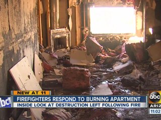 Firefighters respond to burning apartment