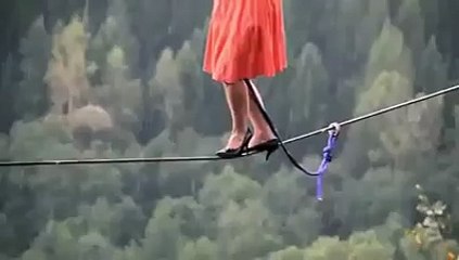 Woman walk over the rope