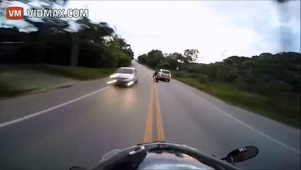 IDIOT RIDER TRIES TO OVERTAKE A CAR AND BREAKS HIS LEG