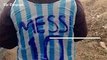 The mystery of a boy pictured wearing a homemade Lionel Messi football shirt – improvised from a blue and white striped