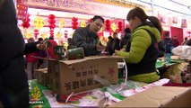 Changing traditions loom over Chinese New Year celebrations
