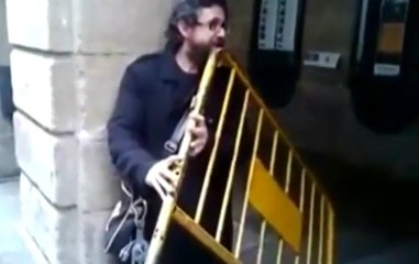 Guy Plays Metal Barrier Like A Flute