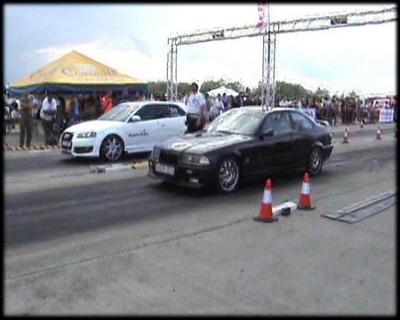 Audi S3 Vs. BMW E36 M3 Drag Race