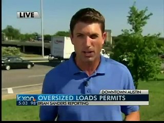 Too-tall load blamed for truck crash