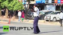 MOONWALKING traffic cop
