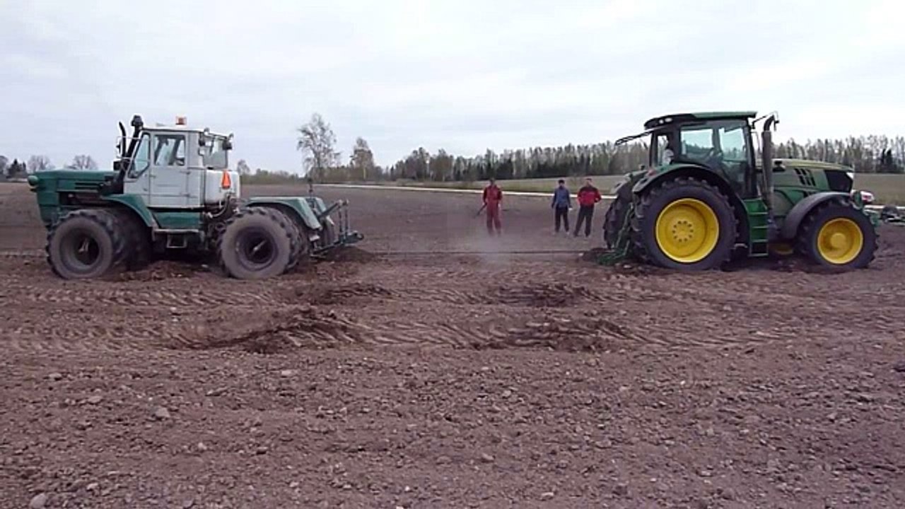 Тракторы – ХТЗ Т-150к vs John Deere, кто сильнее-