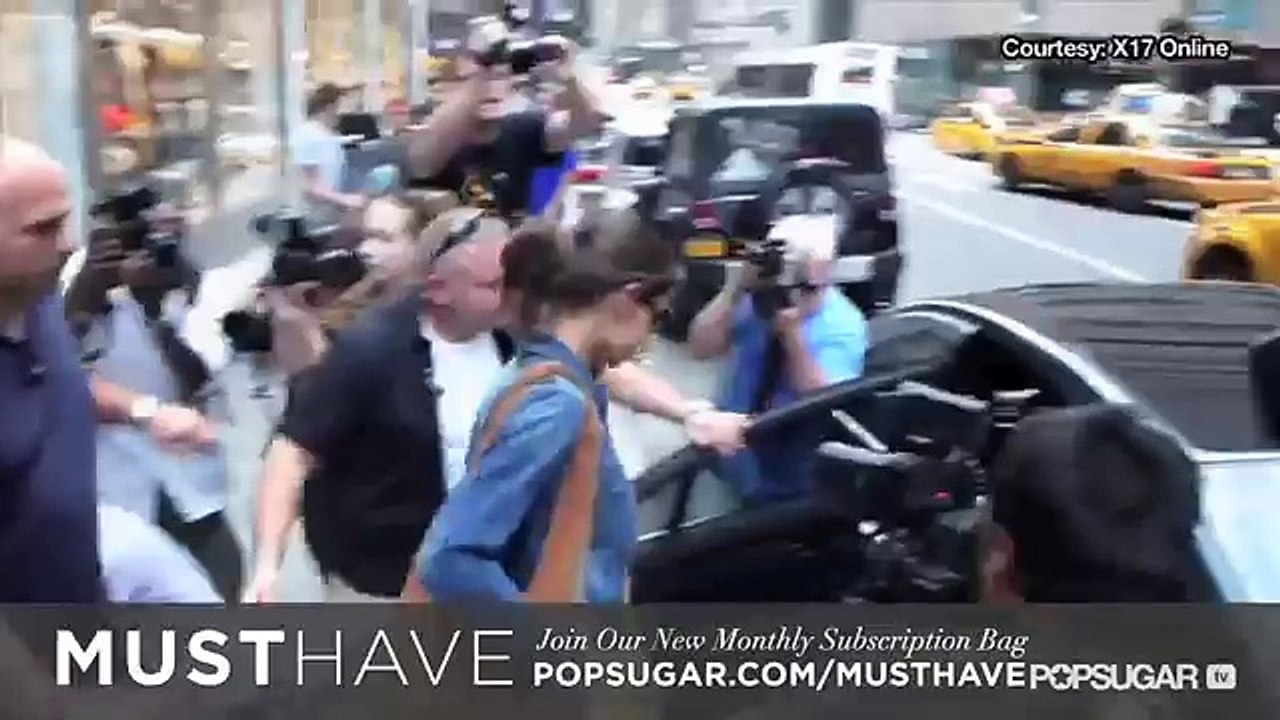 Tom and Katie Settle Divorce Amicably