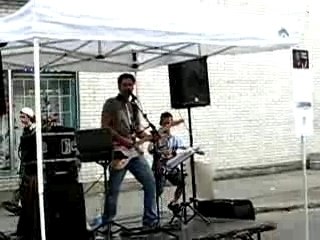 dancing boy with the street performer