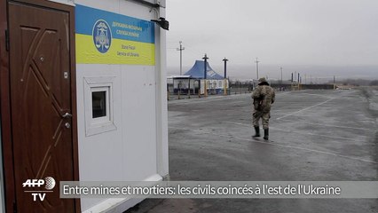 Entre mines et mortiers: les civils coincés à l'est de l'Ukraine