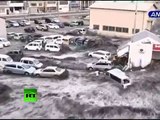 New dramatic video_ Tsunami wave spills over seawall, smashes boats, cars