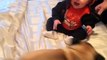 Cute Baby boy laughing while  playing with two Pugs (Very  nice)!!