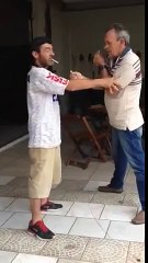 Drunk men's struggle with lighting the cig