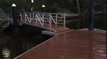 Dog Slides off Deck and Into Water