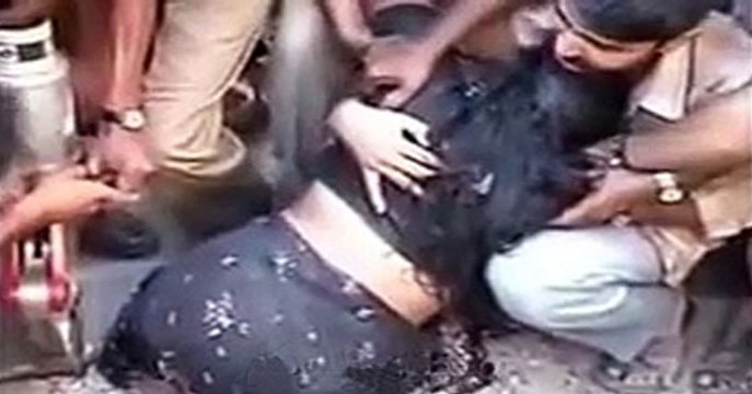 OMG!!! Woman stuck in concrete at road