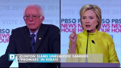 Clinton slams unrealistic Sanders 'promises' in debate