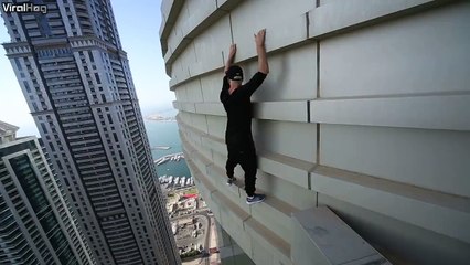 Watch as this crazy stunt man free climbs a high rise building in Dubai.