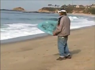 Drunk Man Attempts To Skimboard