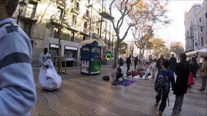 Barcelona illegal hawkers packing up double quick time