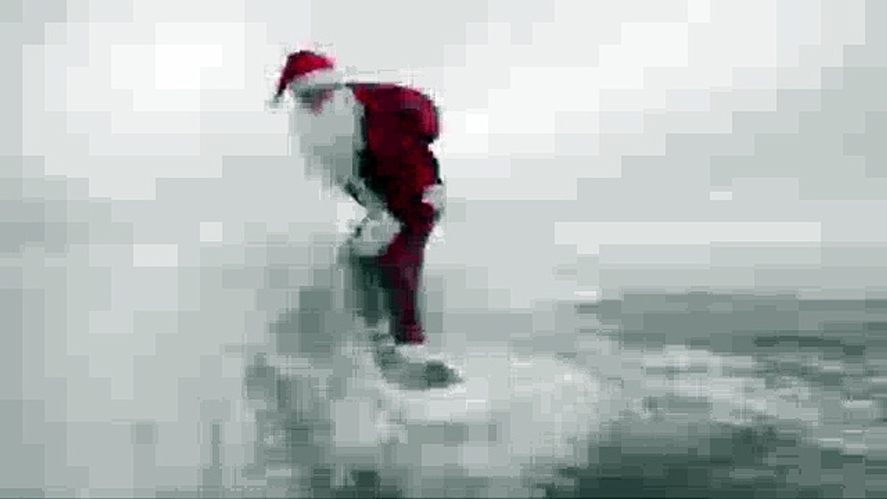 Père noël arrive en surf ^^^^^^
