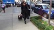 Kourtney Kardashian wears chic winter coat and shades in NY