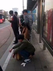 Man shits while waiting for bus