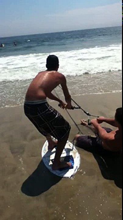 Skimboard slingshot