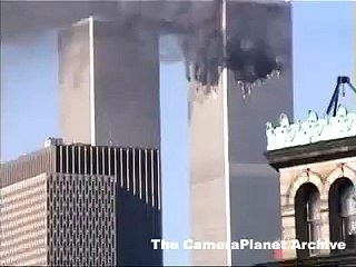 Clear shot of plane hitting tower two and tower in goes up...