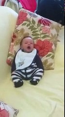 Adorable baby discovers feet for first time