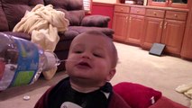 Cute toddler hilariously drinks his water