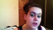 Crazy Girl tattooing her eyebrows on with eBay machine!!
