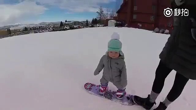 This heart-warming video of a 14-month-old baby trying snowboarding for the first time in her life and totally enjoying