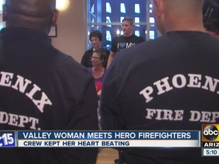 Woman meets firefighters who saved her life