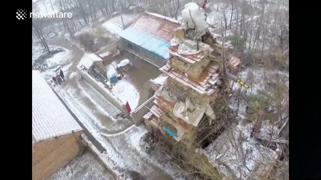 Mentally disabled farmer builds seven-storey building for brothers who passed away