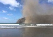 Dust Blankets Sumner Beach After Quake Triggers Cliff Collapse