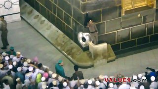 Security Guard Allowing A Child to Kiss Hajr al-Aswad