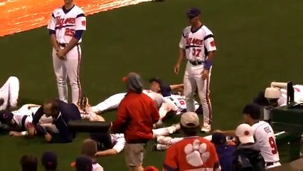 baseball players find a new way to amuse themselves during a rain delay﻿